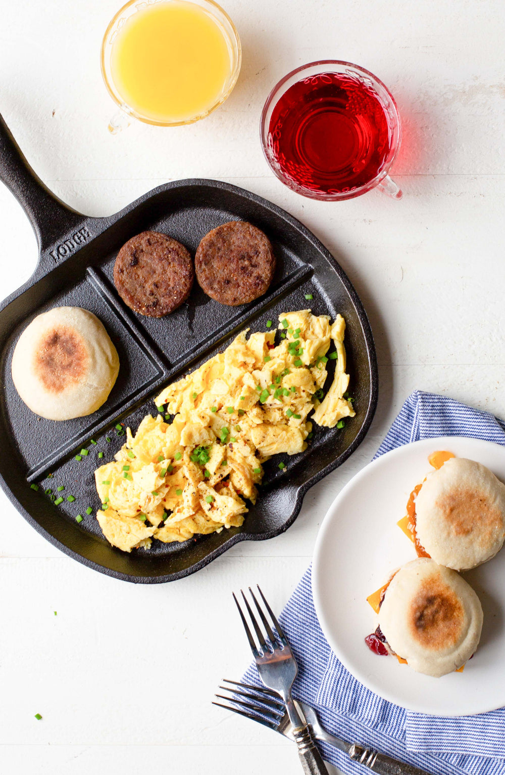 Scrambled eggs, sausage, and biscuits