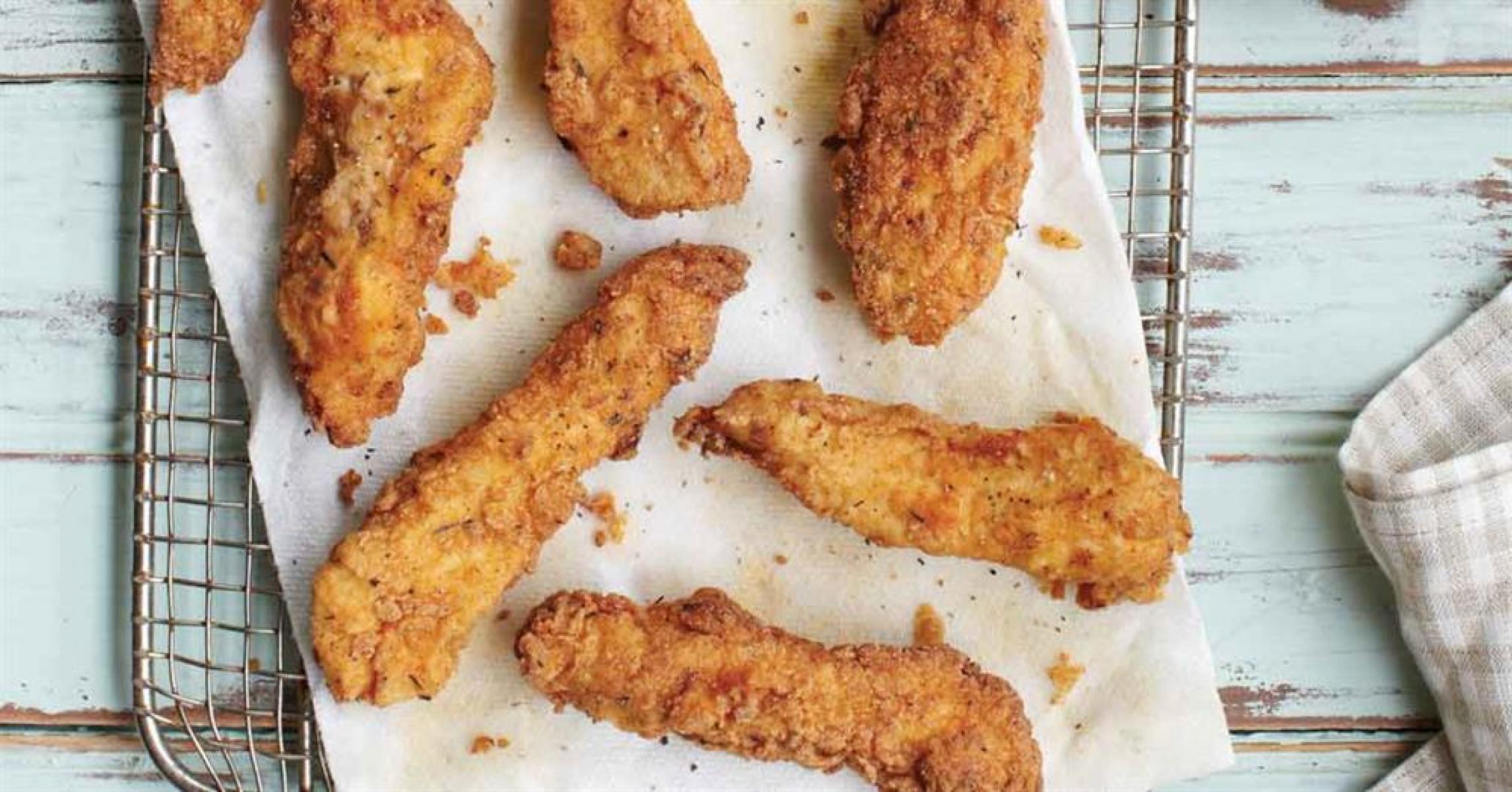Freshly fried chicken strips