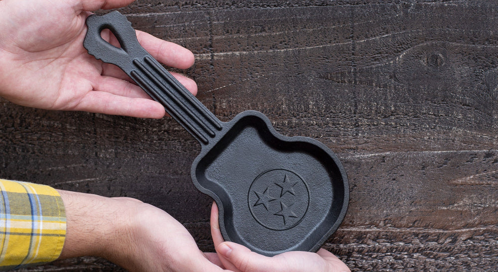 Guitar shaped skillet with a Tennessee Tristar design