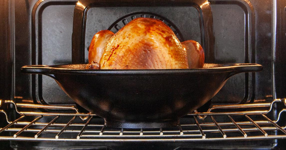 Turkey cooking in oven with a wok