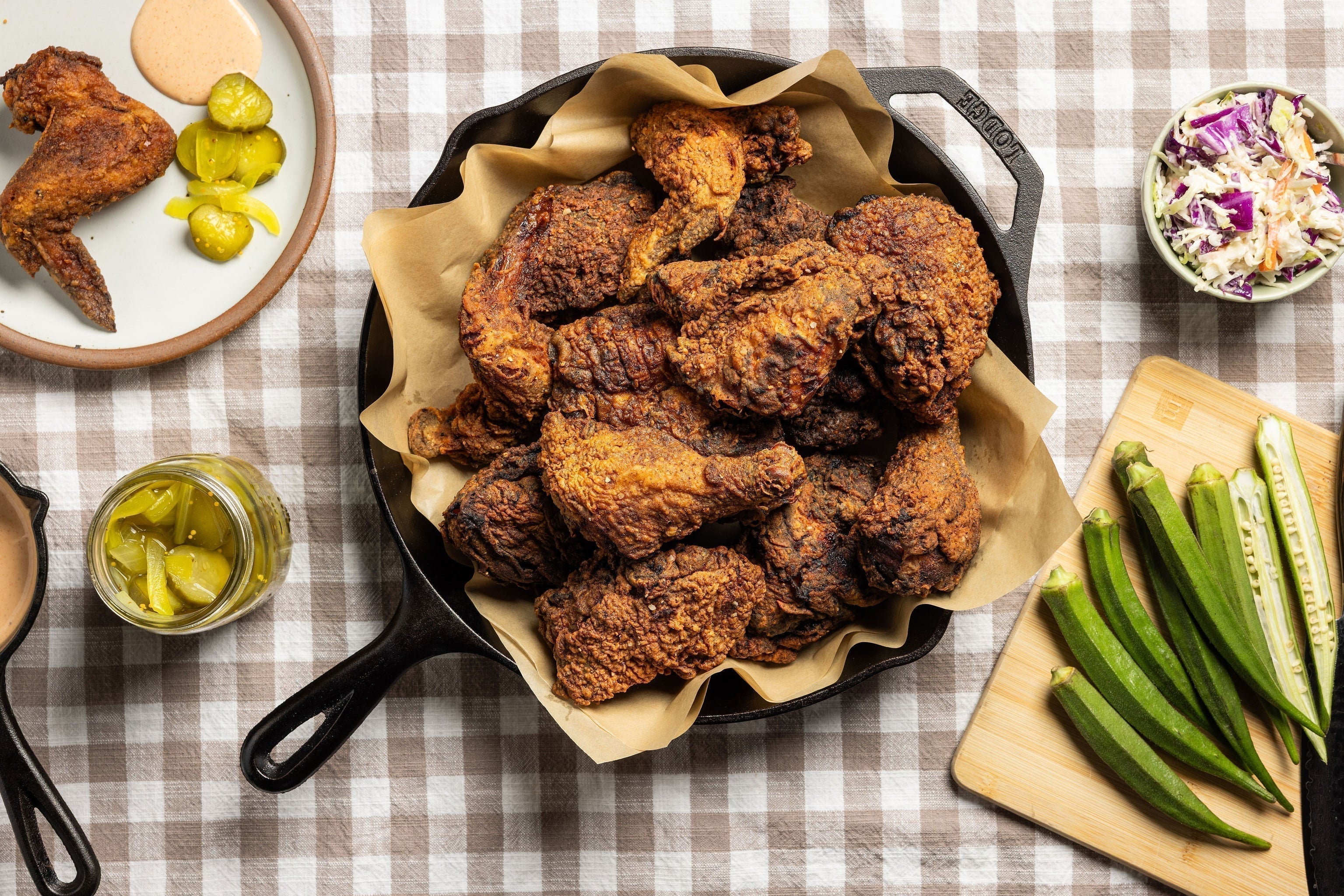 Buttermilk fried chicken served with pickles and okra