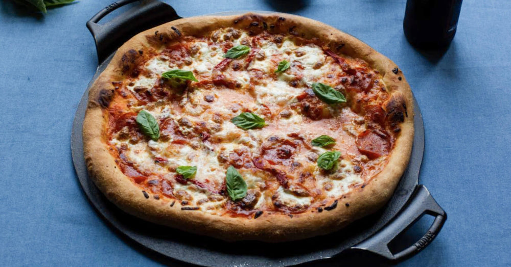 Pepperoni Pizza Topped With Roasted Red Pepper and Basil