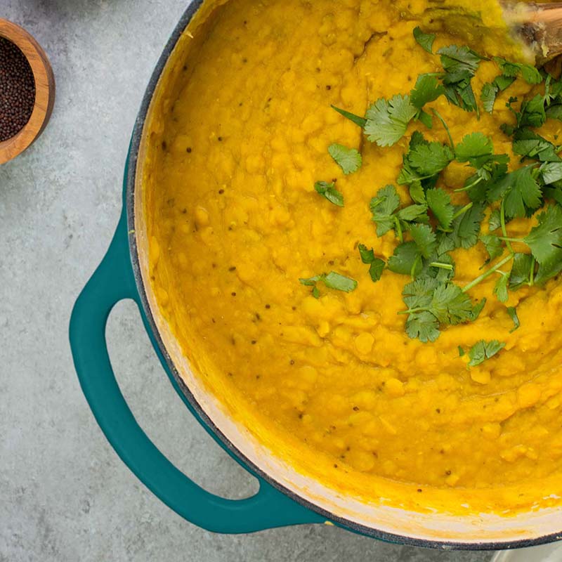 Yellow lentil curry made in dutch oven.