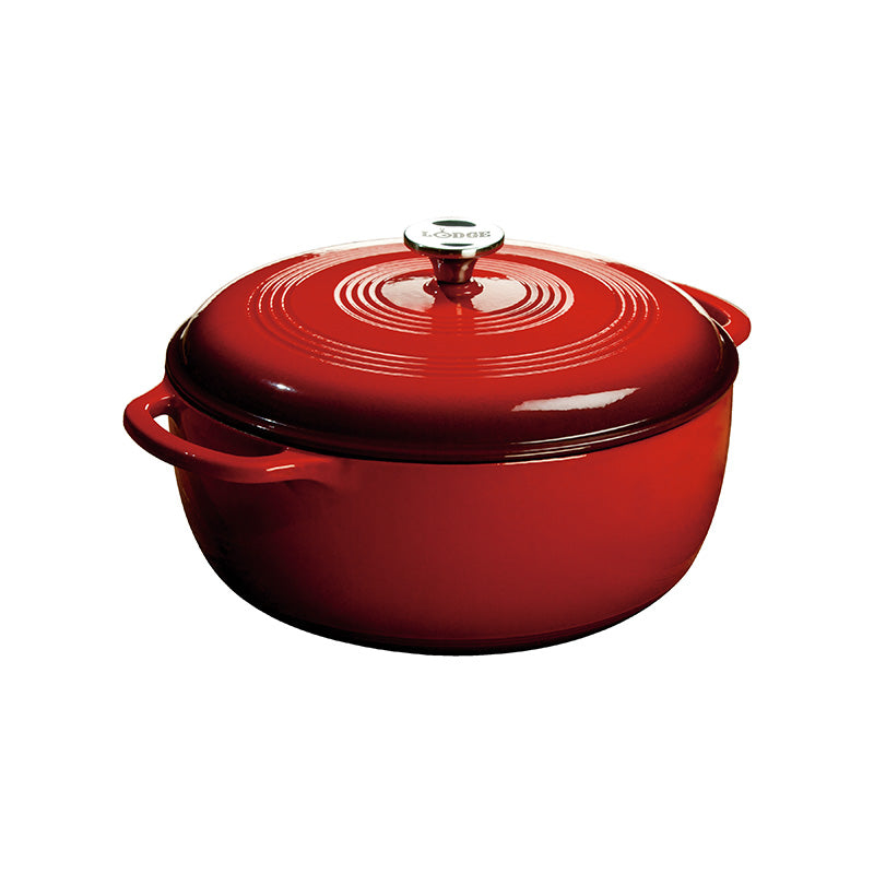 Red gradient enameled cast iron Dutch oven with lid, both pieces have light red on top and darken towards the bottom.
