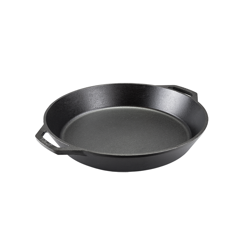 Black cast iron skillet with two loop handles.