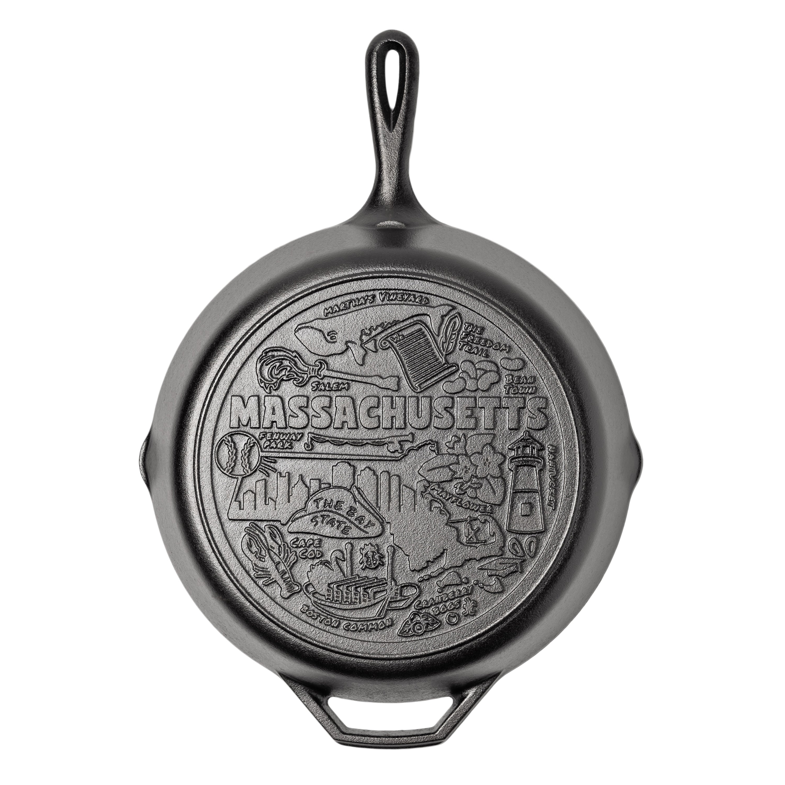 Cast iron skillet with the bottom engraved with beloved icons and monuments from Massachusetts.