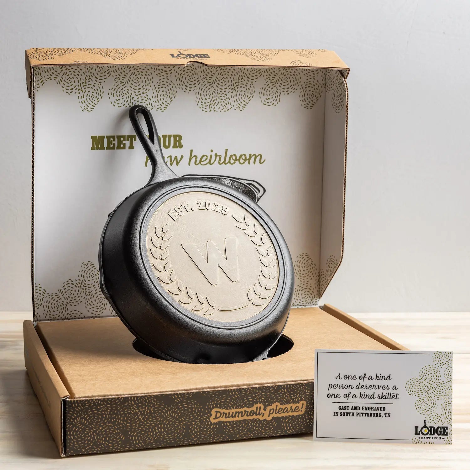 Cast iron skillet in a decorative box with 'Lodge' branding