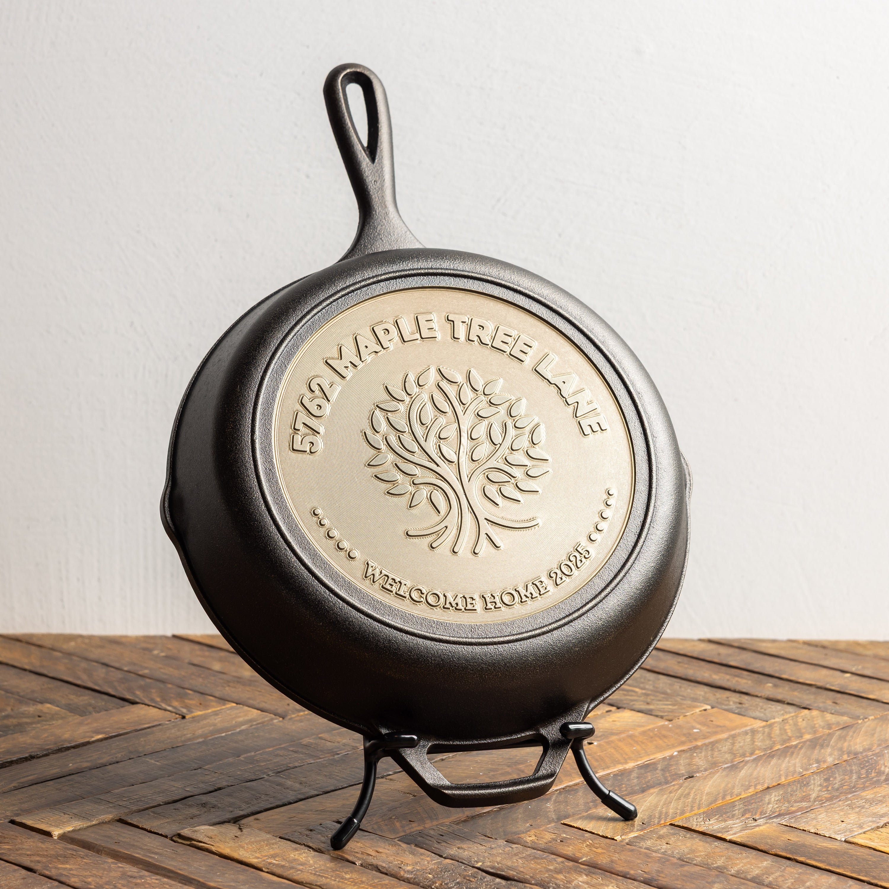 Sample skillet displayed on Lodge skillet display stand to commemorate a new home.