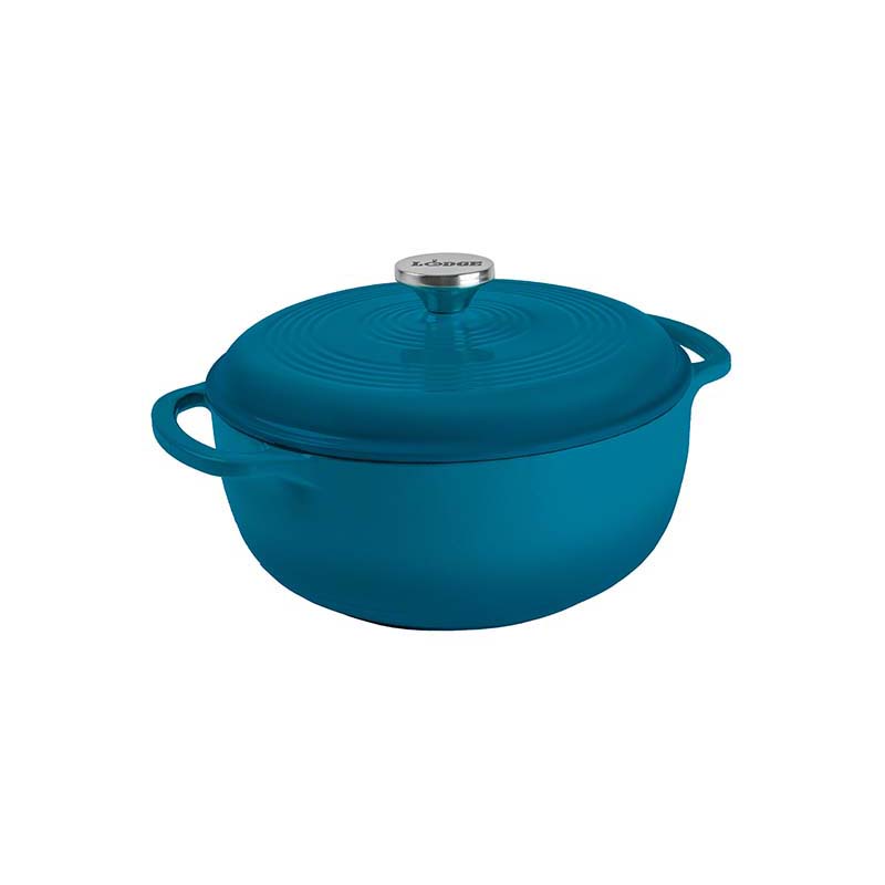 Blue dutch oven on white background.