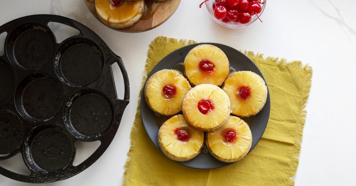 Pineapple Upside Down Cakes served near pan.