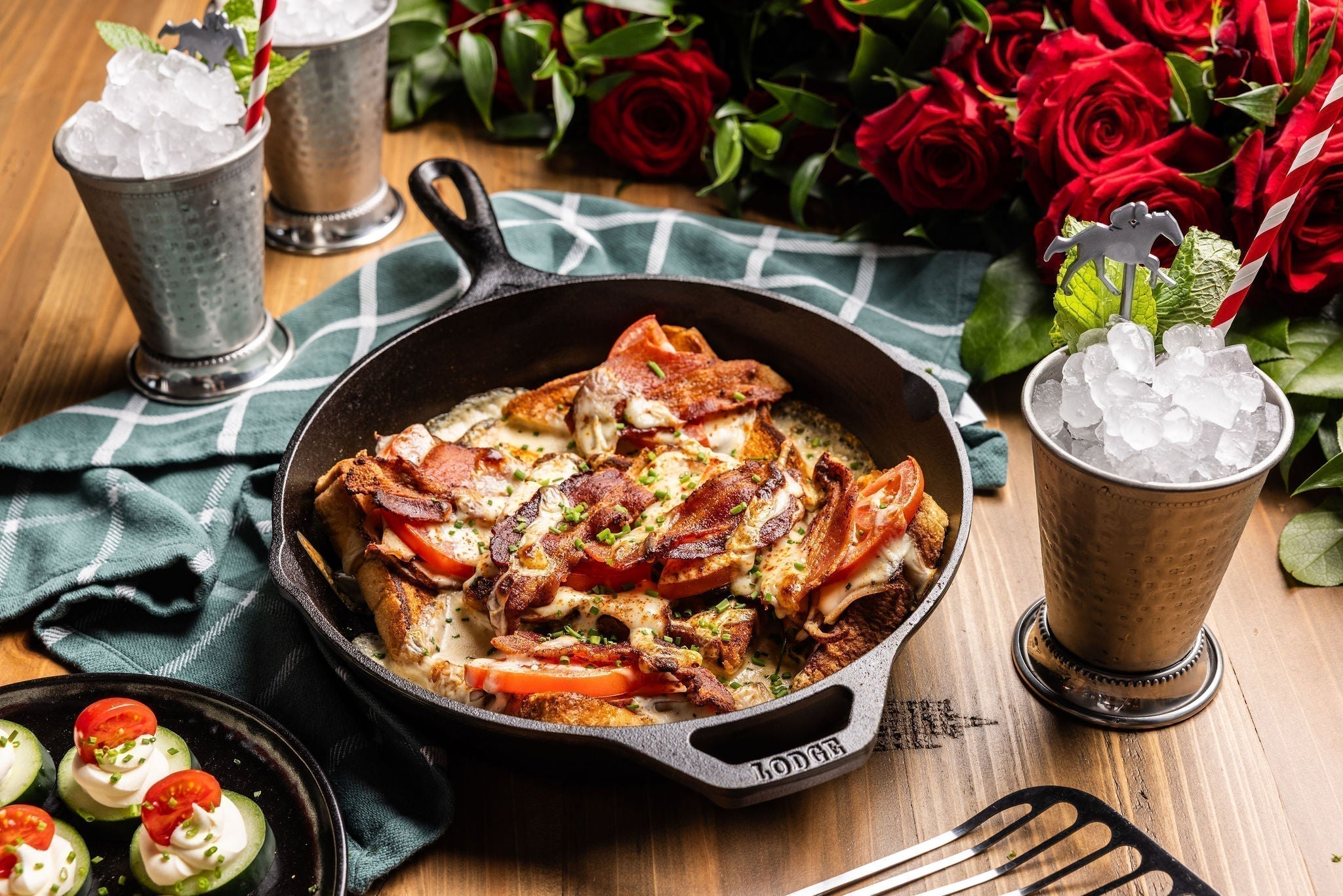 Kentucky Hot Brown served in skillet with Mint Julep drinks.