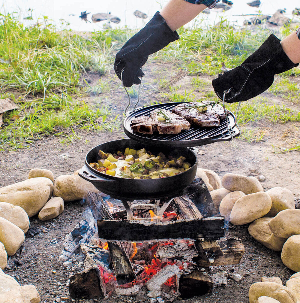 Someone cooking with cook-it-all at campsite
