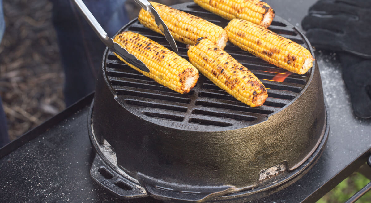 Corn roasting on kickoff grill