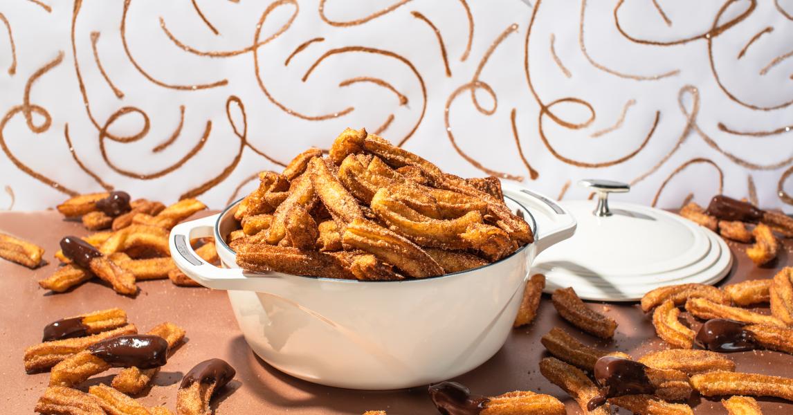 Dutch oven filled with churros.