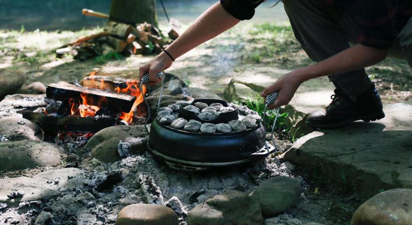 Cast Iron Cook-It-All being used at campsite