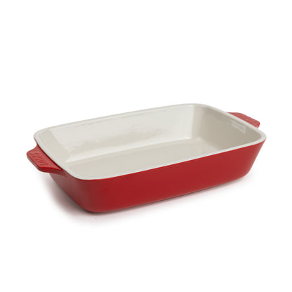 Cherry-red 11-by-7.5-inch stoneware casserole dish with white interior.