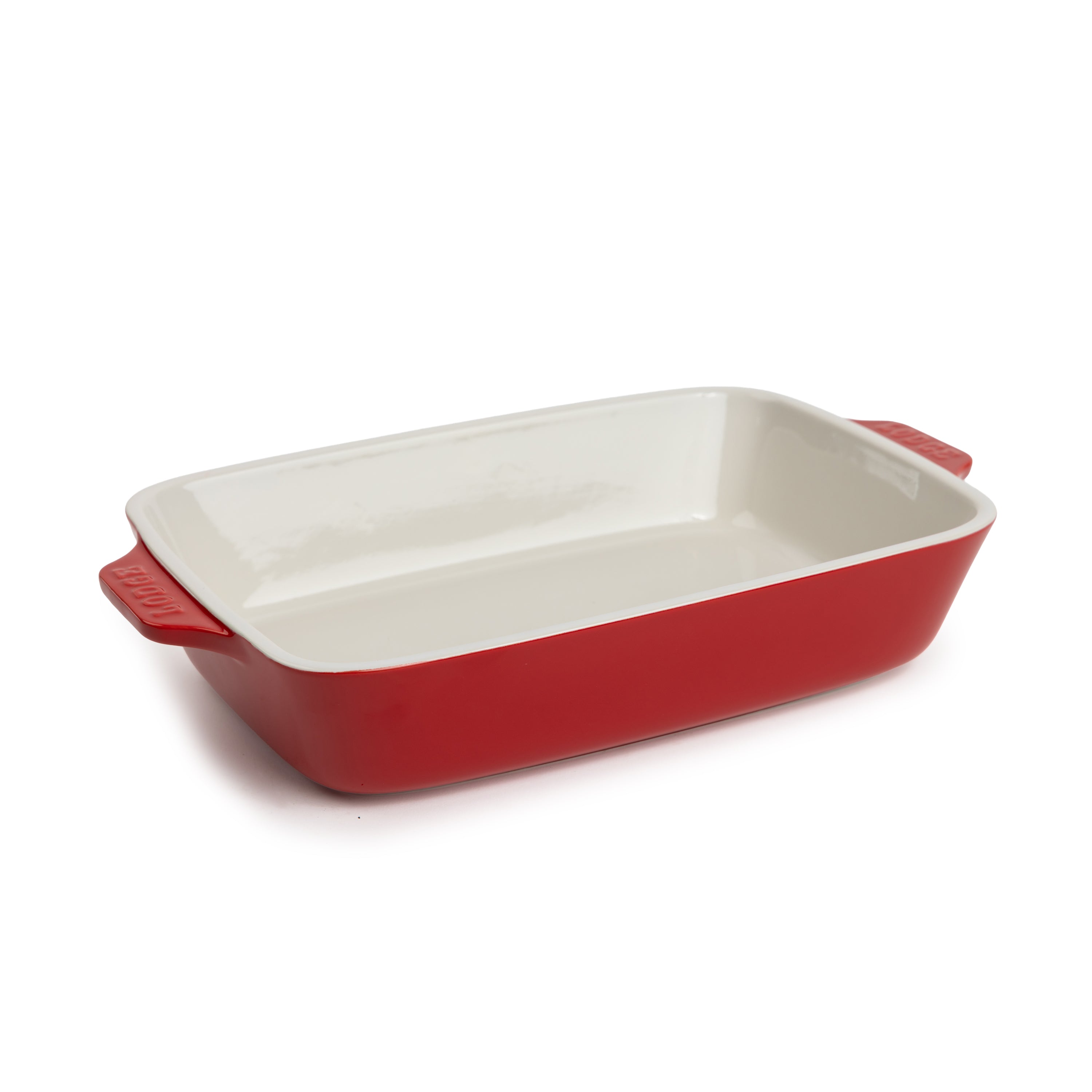 Cherry-red 11-by-7.5-inch stoneware casserole dish with white interior.