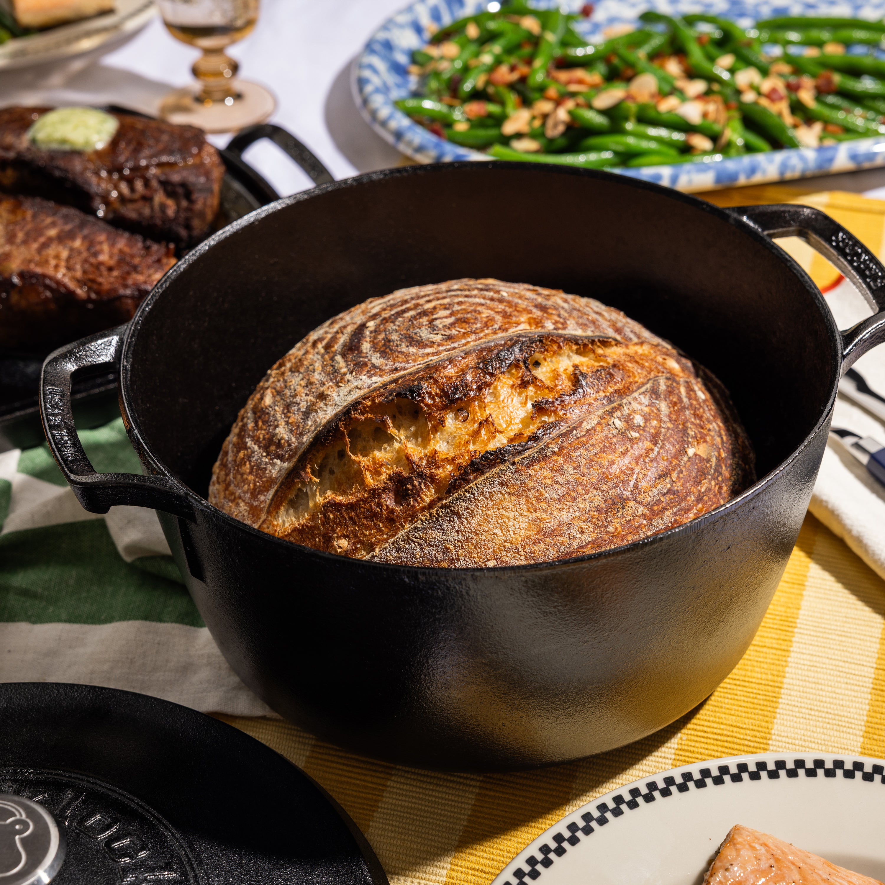 Freshly baked bread, served and prepared in dutch oven.