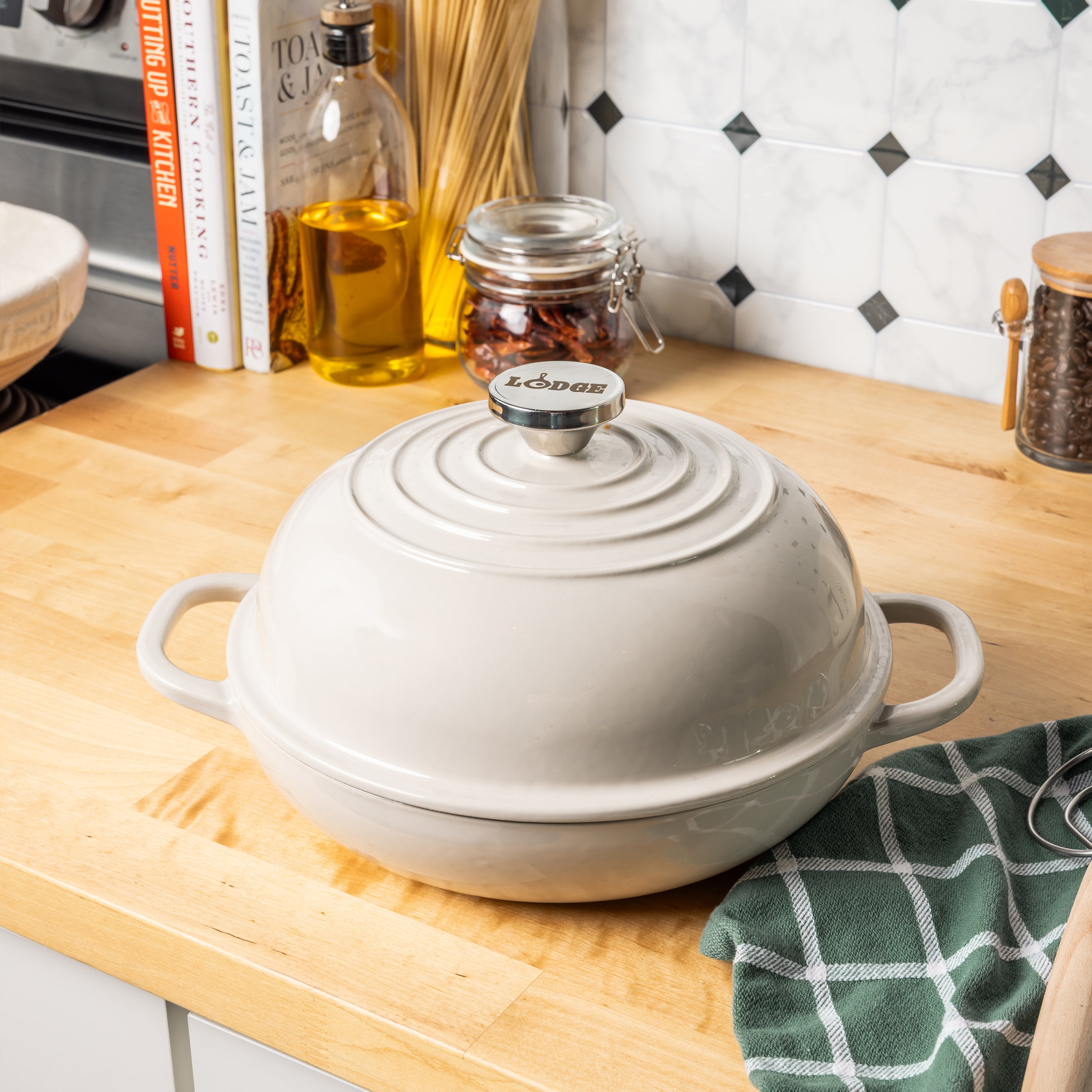 Oyster colored bread oven on kitchen table.