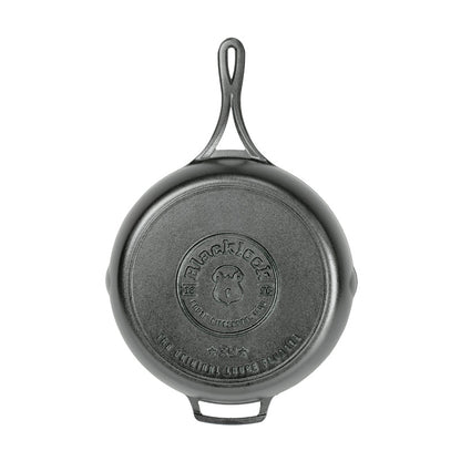 Bottom of skillet featuring the Blacklock collection logo.