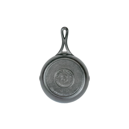 Bottom of skillet featuring the Blacklock collection logo.