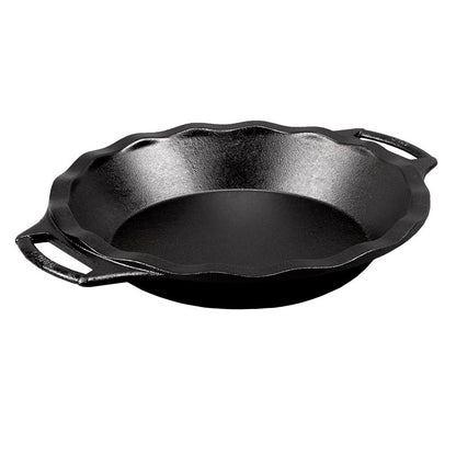 A black cast iron pie pan with two handles on the sides.