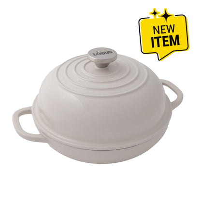 A white enameled cast iron lidded casserole dish with side handles and a small silver knob on top, shown on a white background with a yellow 'NEW ITEM' badge in the top right corner.