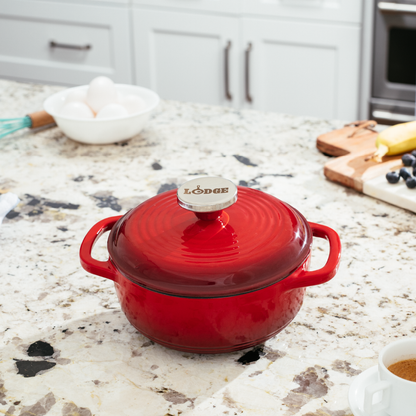 Dutch oven on kitchen counter near prepped ingredients.