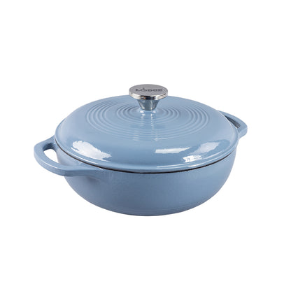 Storm blue enameled cast iron Dutch oven with lid on a white background