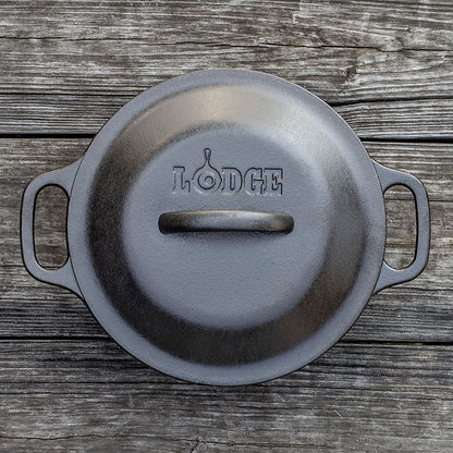Top view of dutch oven with lid, featuring Lodge branding and lid handle.