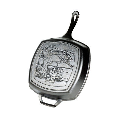 A black cast iron square grill pan with a embossed fish and wildlife design on the back of cooking surface.