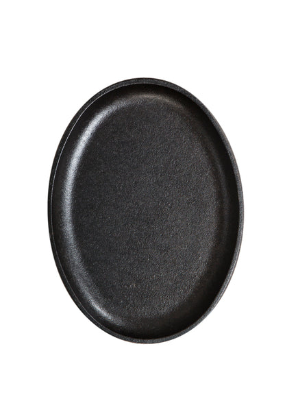 Top view of griddle, featuring cooking surface and raised edges.