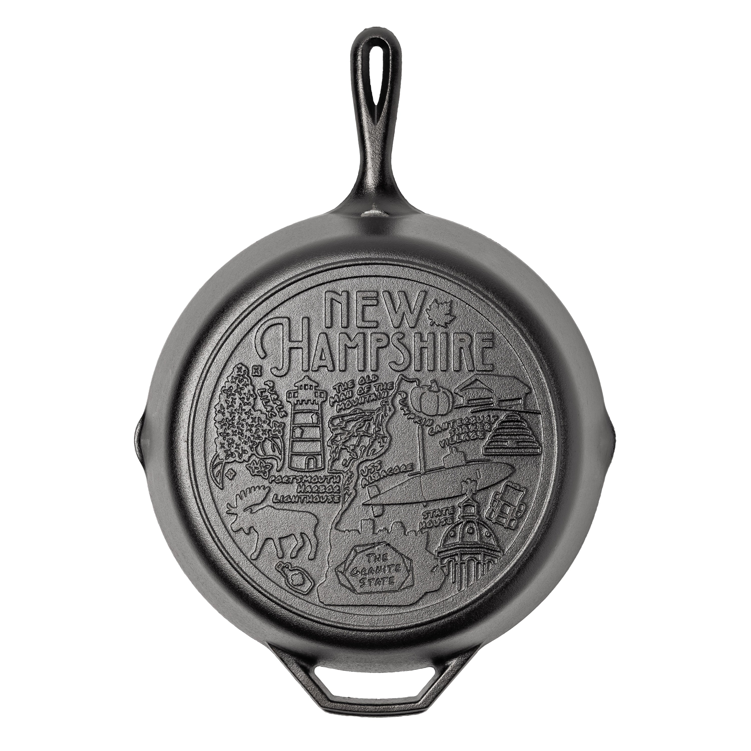 Cast iron skillet with the bottom engraved with beloved icons and monuments from New Hampshire.