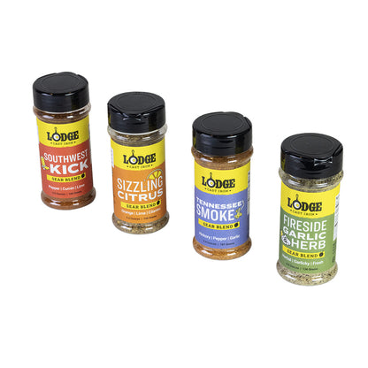 Four bottles of Lodge seasoning blends on a white background