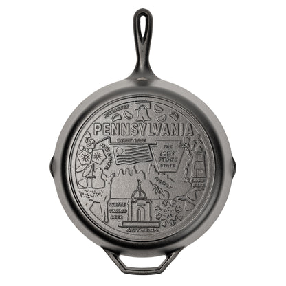 Cast iron skillet with the bottom engraved with beloved icons and monuments from Pennsylvania.