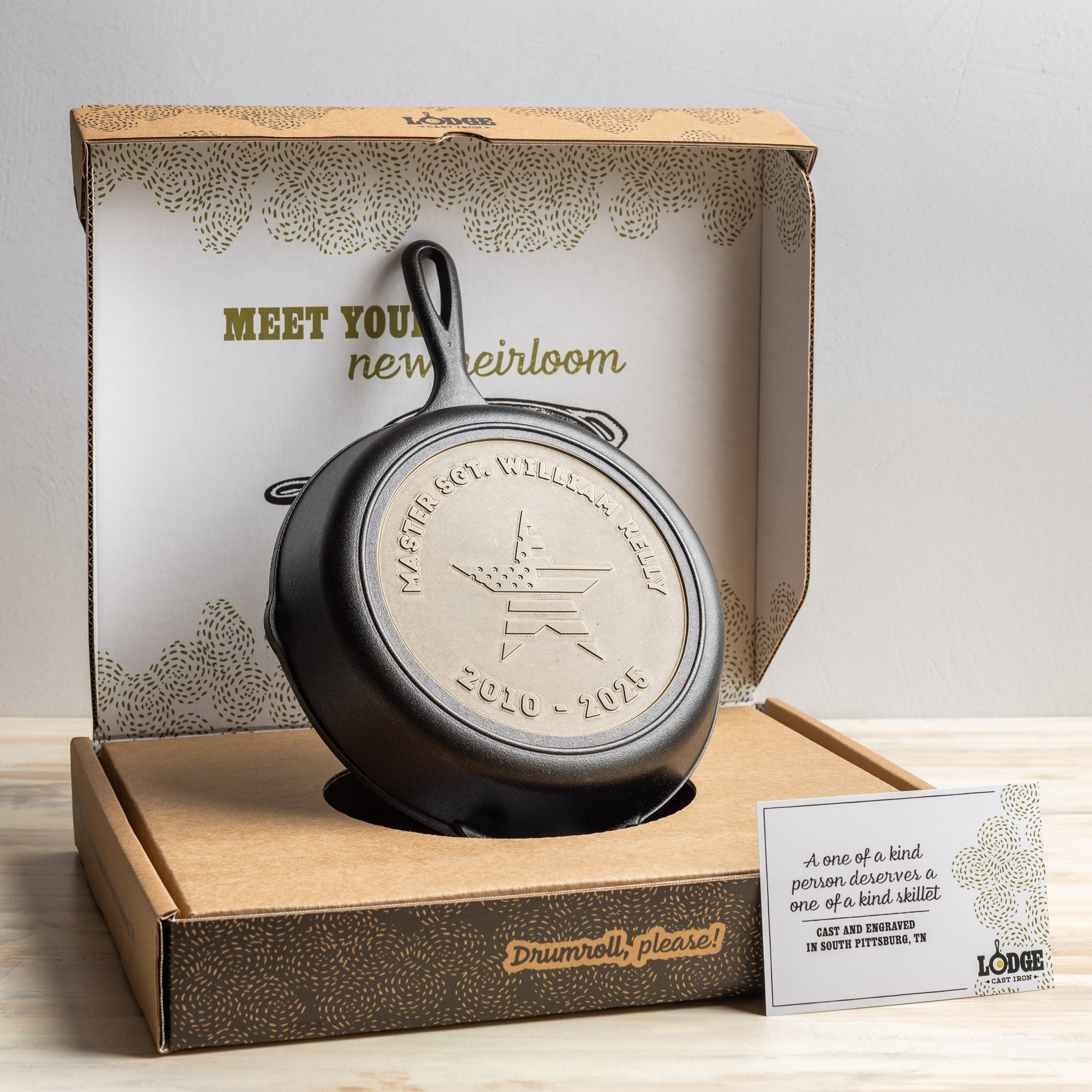 Custom Cast iron skillet in a decorative box with branding and text.