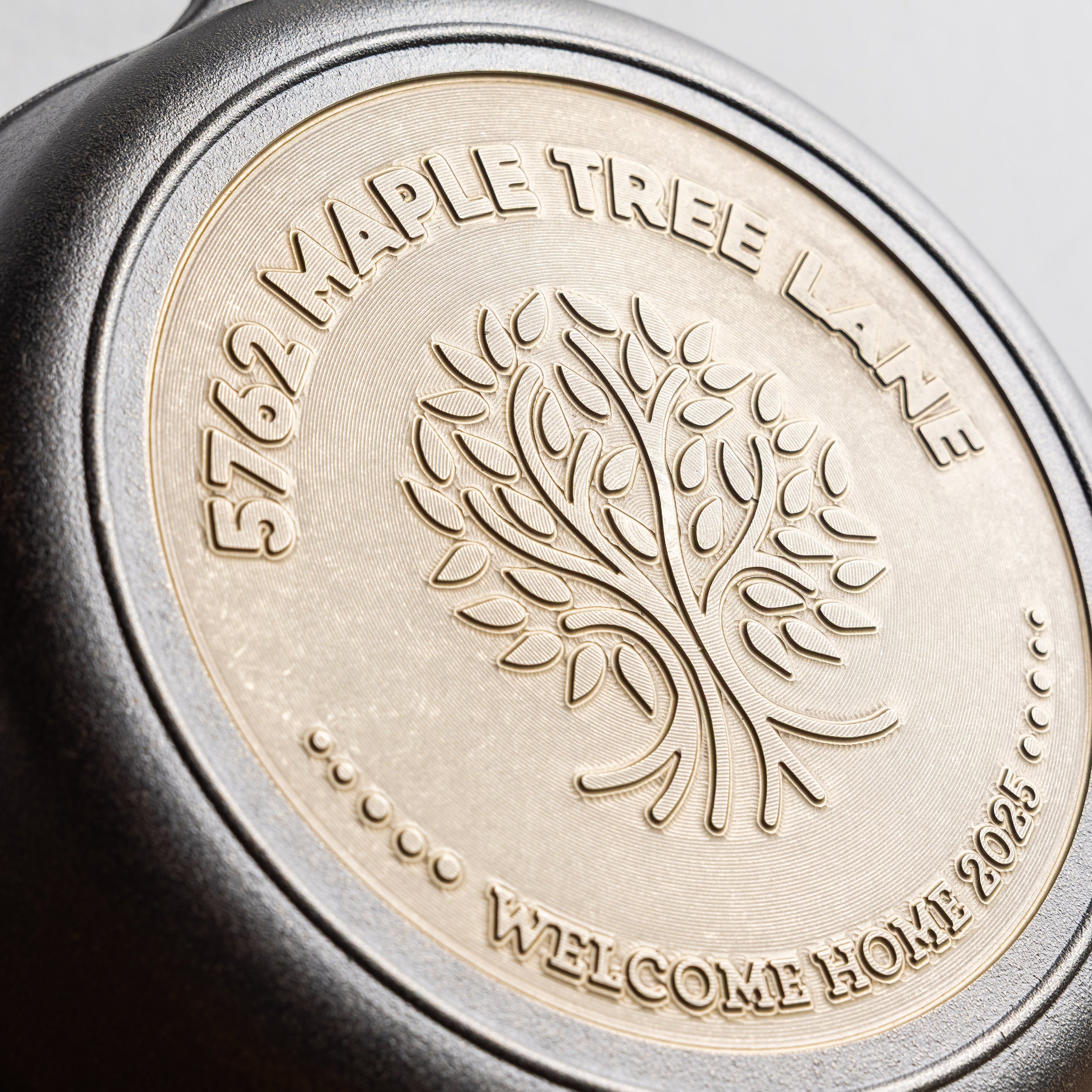 Close-up of engraved design.