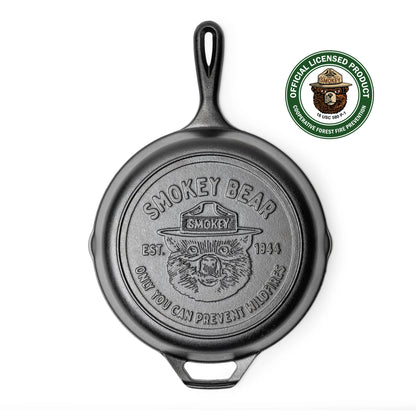 Cast iron skillet with officially licensed Smokey Bear logo on bottom.