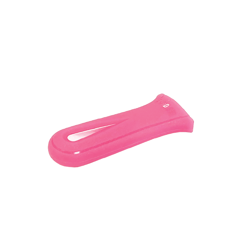 Pink silicone handle holder with indent to provide a secure grip on handle.