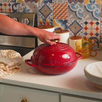 Someone lifting lid off of bread oven, revealing steam and a beautifully baked bread.