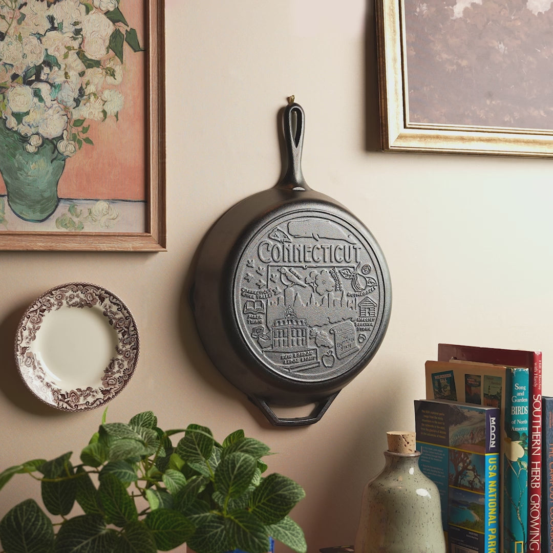 Close up shot of the engraved design on bottom of skillet.