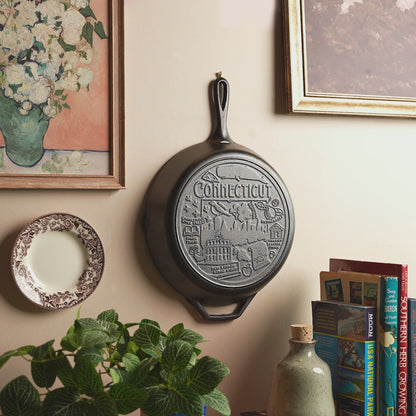 Close up shot of the engraved design on bottom of skillet.