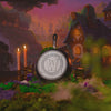 Skillet displayed with fantasy background alongside burning candles and rolling smoke.