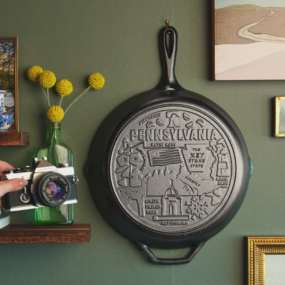 Close up view of engravings on bottom of the skillet.