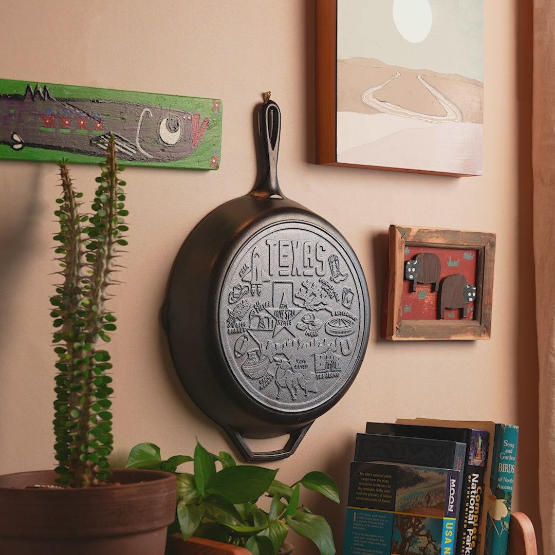Close-up view of the monuments and icons that fill the bottom of the skillet.