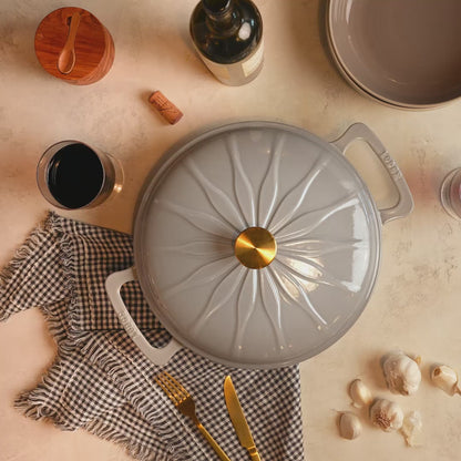 Close-up view of braiser sunburst design.