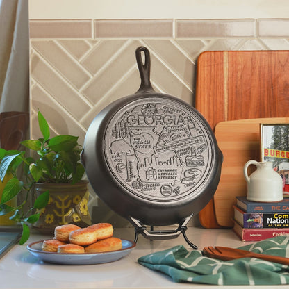 Close up view of state skillet displayed on kitchen counter with our skillet stand.