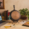 Custom skillet sample displayed on desk as a sales reward.